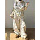 Model wearing the beige Flowy Freedom Pants