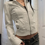 Model wearing the beige Urban Edge Cropped Jacket