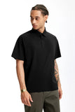 Model wearing the black Modern Fit Polo Shirt