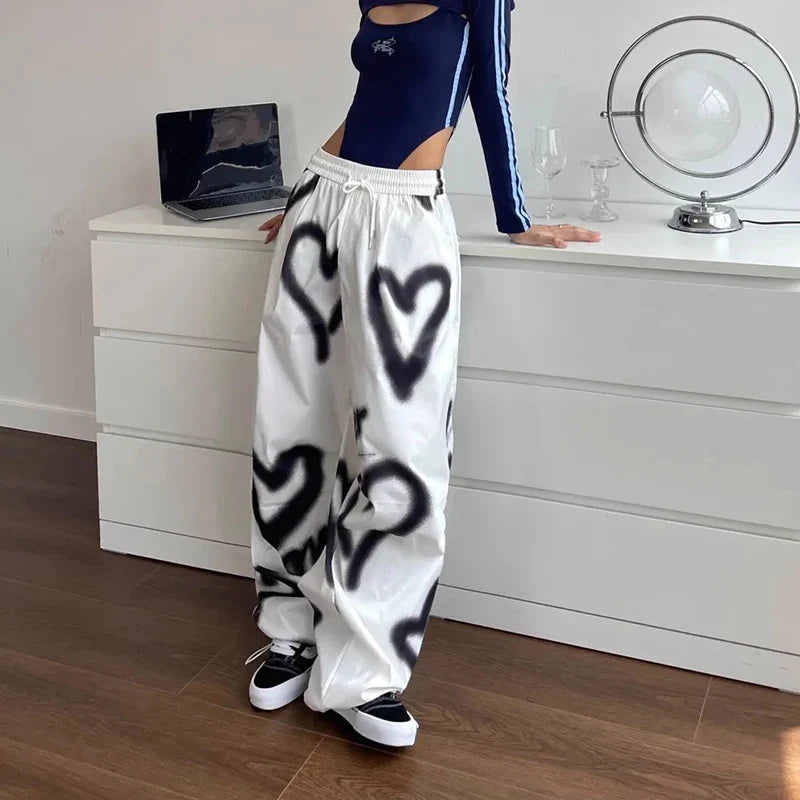 Model wearing the white Graffiti Heart Lounge Pants