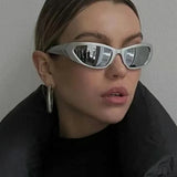 Model wearing the white Sleek Vision Sunglasses
