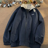 Front view of the blue Streamline Zip Jacket