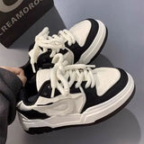 Model wearing the black Chunky Patterned Sneakers