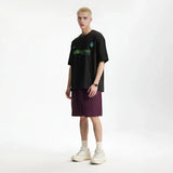 Model wearing the black Catalyst Quote T-Shirt