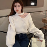 Model wearing the white Off Shoulder Christmas Sweater
