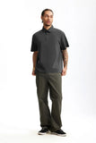 Model wearing the dark gray Modern Fit Polo Shirt