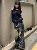 Model wearing the blue Grunge Distressed Denim Jeans