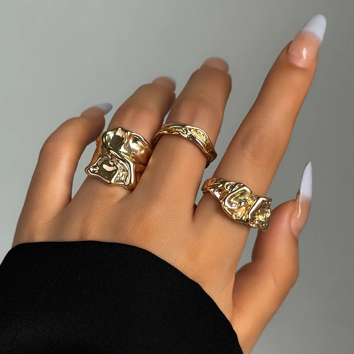Model wearing the gold Folded Tin Foil Rings