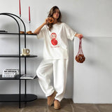 Retro Minimal Graphic Nesting Doll Print T-Shirt