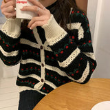 Model wearing the black Floral Pattern Sweater