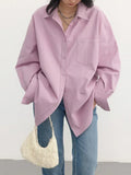 Model wearing the pink Relaxed Fit Button-Up Shirt