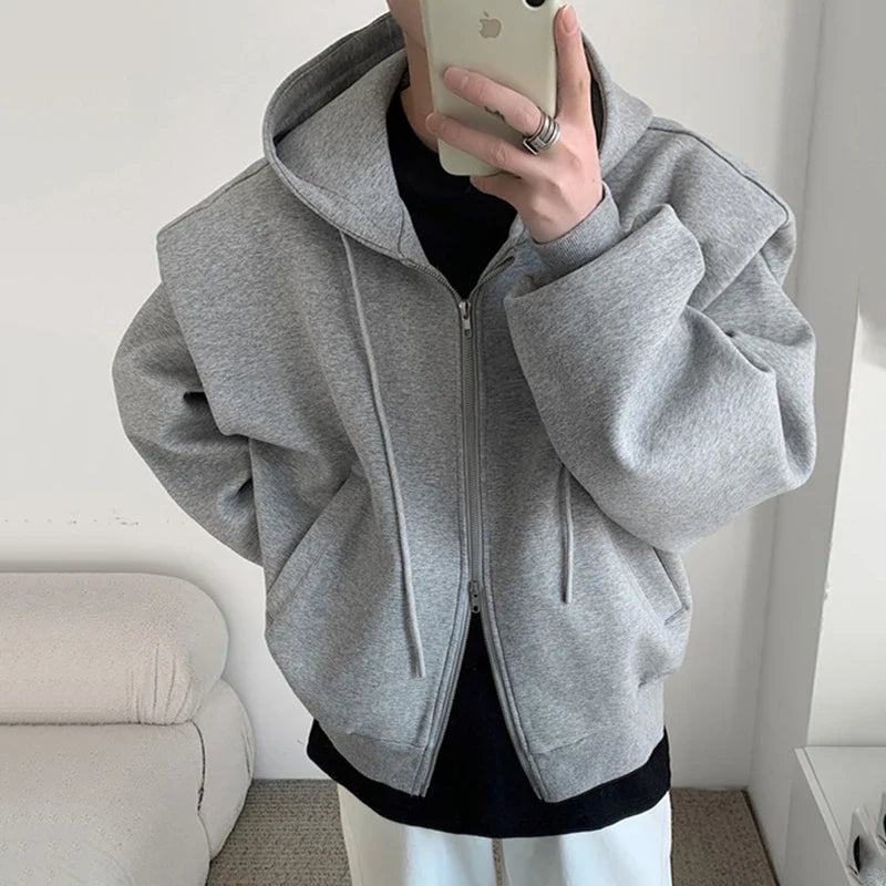 Model wearing the gray Oversized Hooded Front-Open Sweatshirt