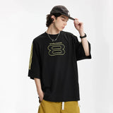 Model wearing the black Y2K Infinity T-Shirt 