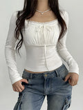 Model wearing the white Bust Bow Ruched CoquetteTop 