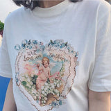 Model wearing the white Cherub Heart With Love And Devotion T-Shirt