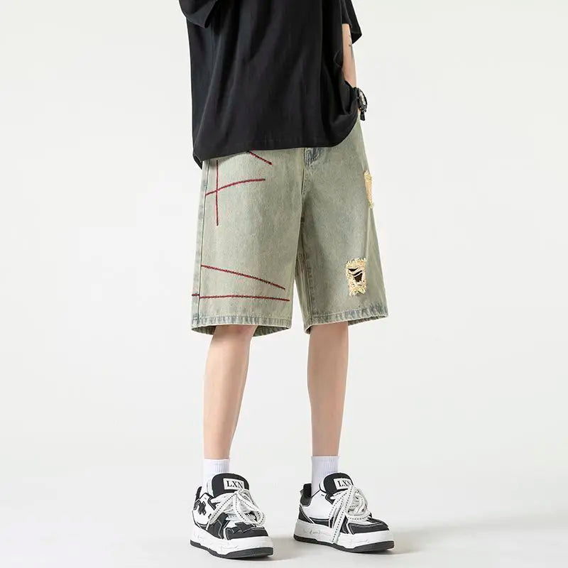Stylish Spliced Button Zipper Ripped Shorts