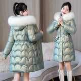 Model wearing the green Women's Long Quilted Puffer Jacket