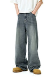 Model wearing the dark gray blue Retro Freedom Fit Jeans in a gray background