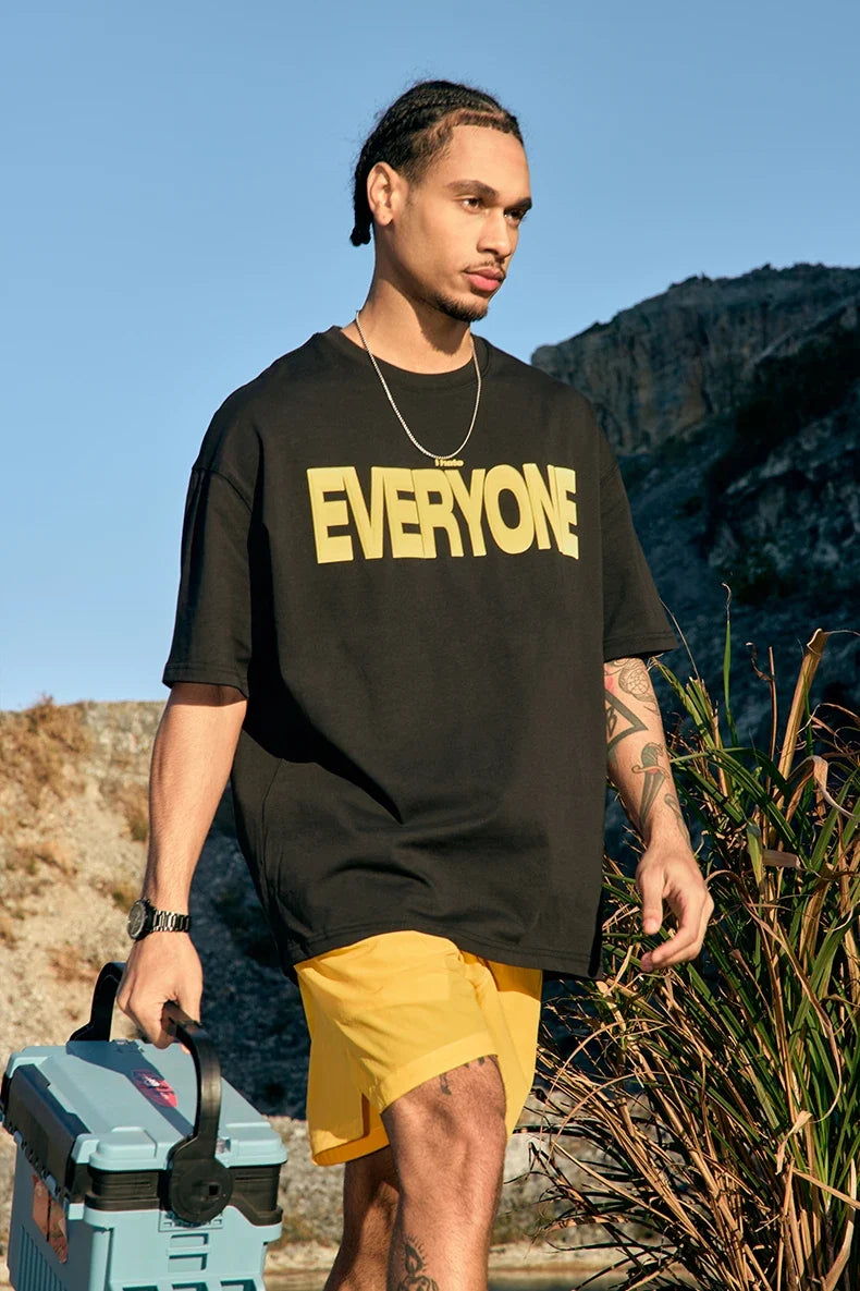 Model wearing the black EVERYONE Oversized T-Shirt