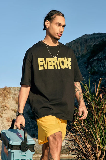 Model wearing the black EVERYONE Oversized T-Shirt