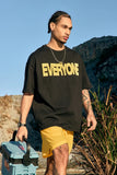 Model wearing the black EVERYONE Oversized T-Shirt