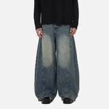 Model wearing the blue Y2K Gravity Denim Jeans