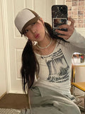 Model wearing the white Infinite Dreams Long-Sleeve T-Shirt