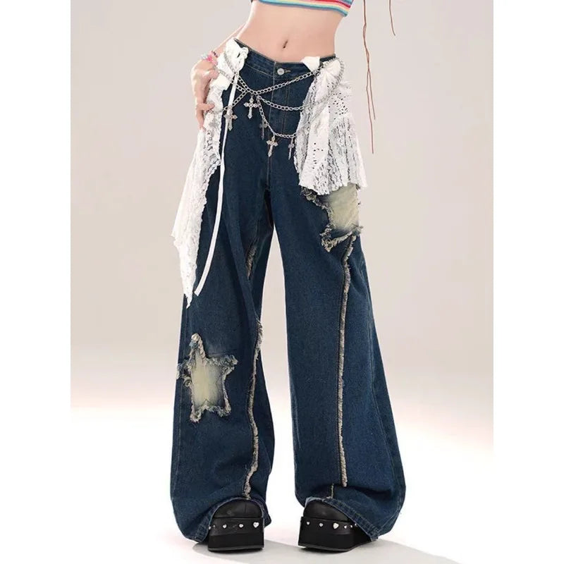 Model wearing the blue Distressed Star Patch Flare Jeans 