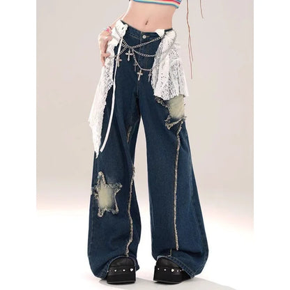 Model wearing the blue Distressed Star Patch Flare Jeans 