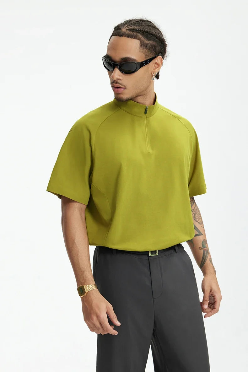 Model wearing the green The Urban Zip T-Shirt