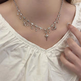 Model wearing the Y2K Starburst Necklace