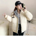 Model wearing the White Oversized Women's Puffer Jacket