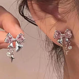 Model wearing the pink Gleaming Charm Drops Earrings