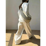 Model wearing the beige Flowy Freedom Pants