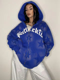 Model wearing the blue Gothic Script Oversized Sweatshirt in a gray background