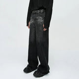 Model wearing the black Wide-Leg Tailored Jeans