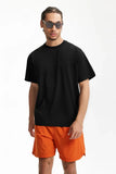 Model wearing the black Y2K Essential T-Shirt