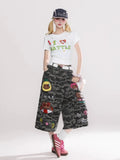 Reddachic Cartoon Patched Camo Jorts