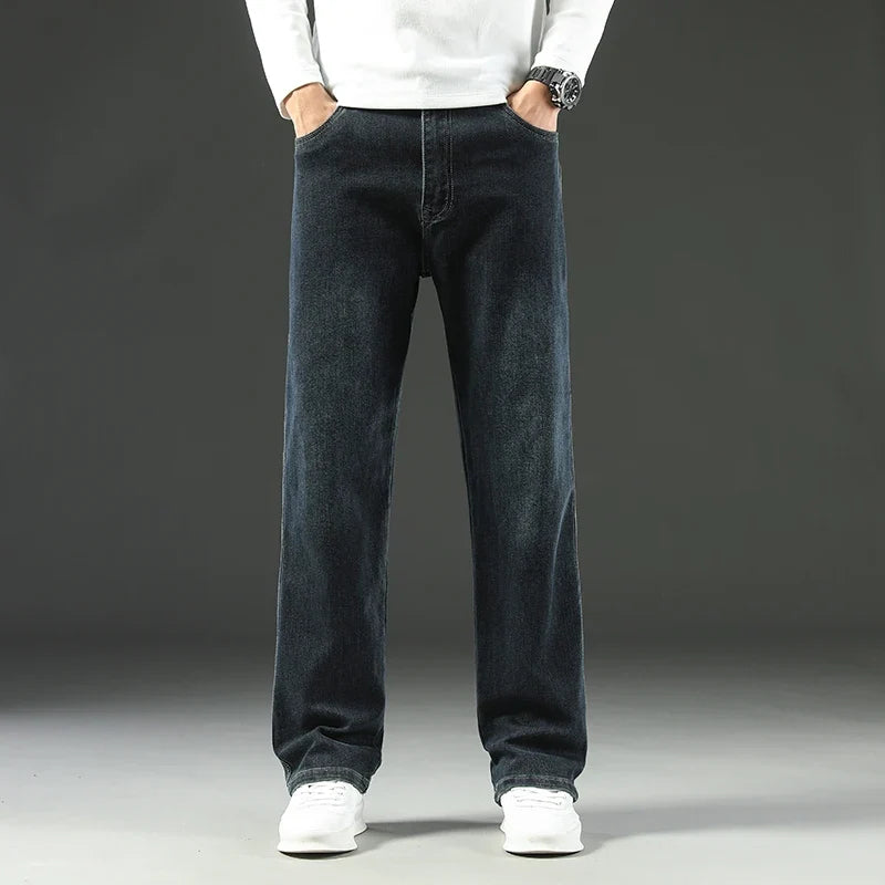 Model wearing the gray black Classic Denim Jeans