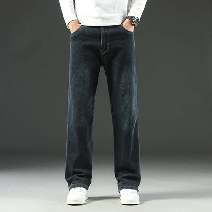 Model wearing the gray black Classic Denim Jeans