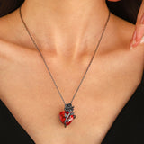 Model wearing the red Heart of Throns Necklace 