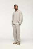 Model weearing the gray Comfort Fit Drawstring Pants