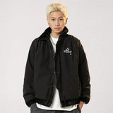 Model wearing the black Chic Fleece-Lined Jacket in a gray background