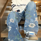 Model wearing the blue Floral Wide-Leg Jeans