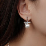 Dazzling Bowtie Ribbon Pearl Clear CZ Errings