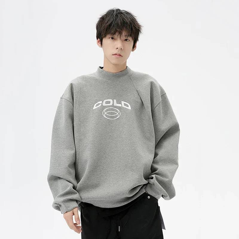 Model wearing the gray Cold Graphic Sweatshirt