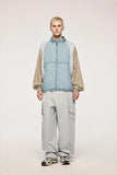 Model wearing the gray Fractal Elegance Cargo Pants