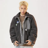 Model wearing the dark grey Arctic Breeze Puffer Jacket in a gray background