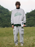 A guy wearing Los Angeles Sweatshirt in outdoor