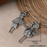 Retro Minimalist Couple Character Metal Pendant Earrings